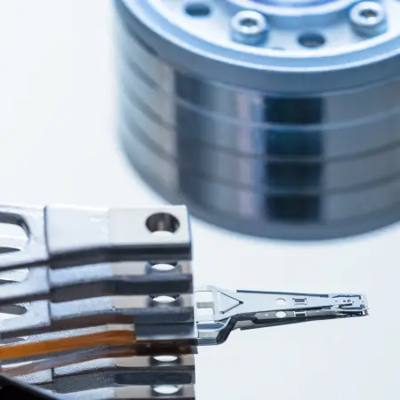 Close-up image of read/write heads from a hard drive.